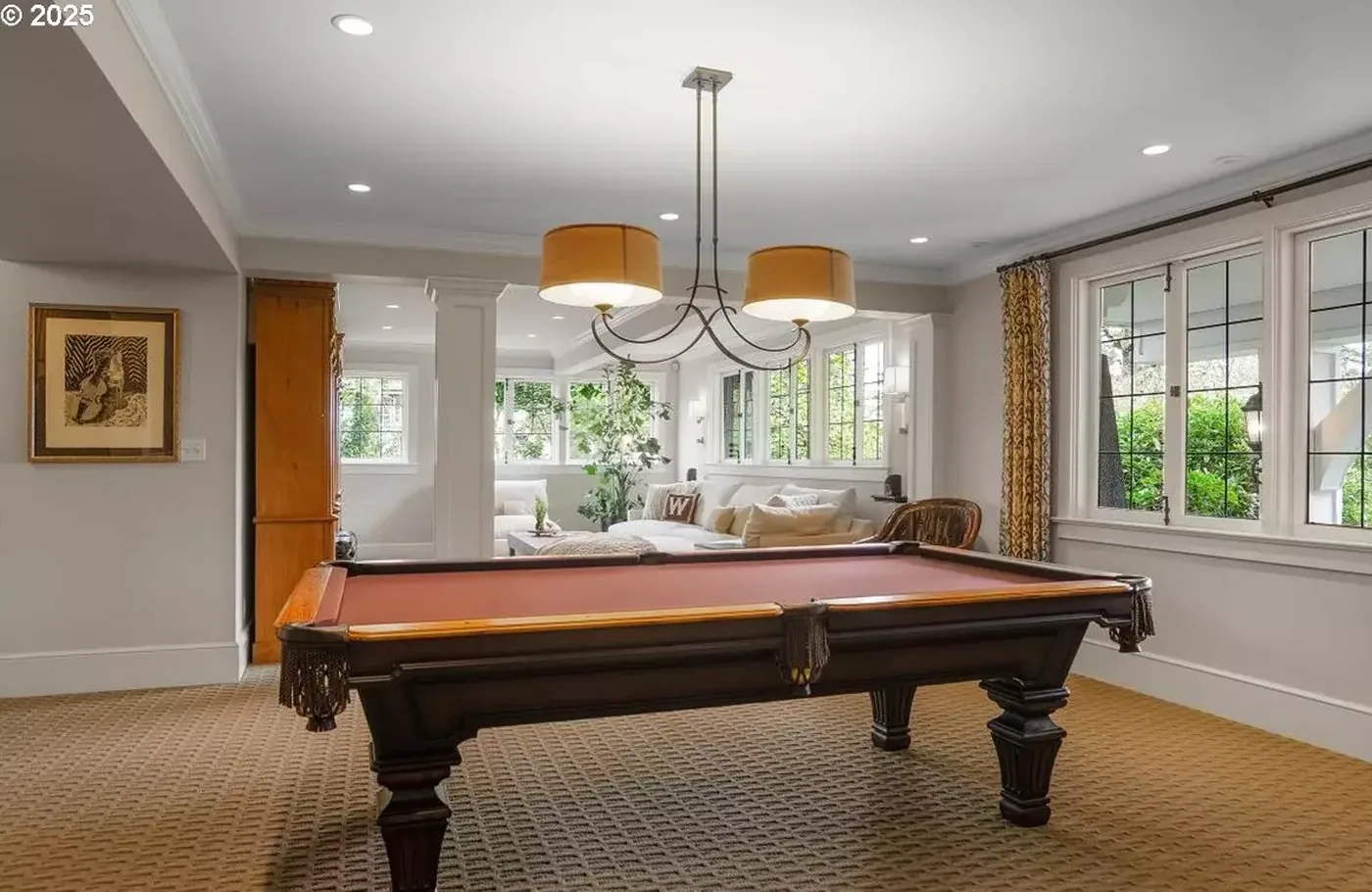 Game room with grey walls and white trim