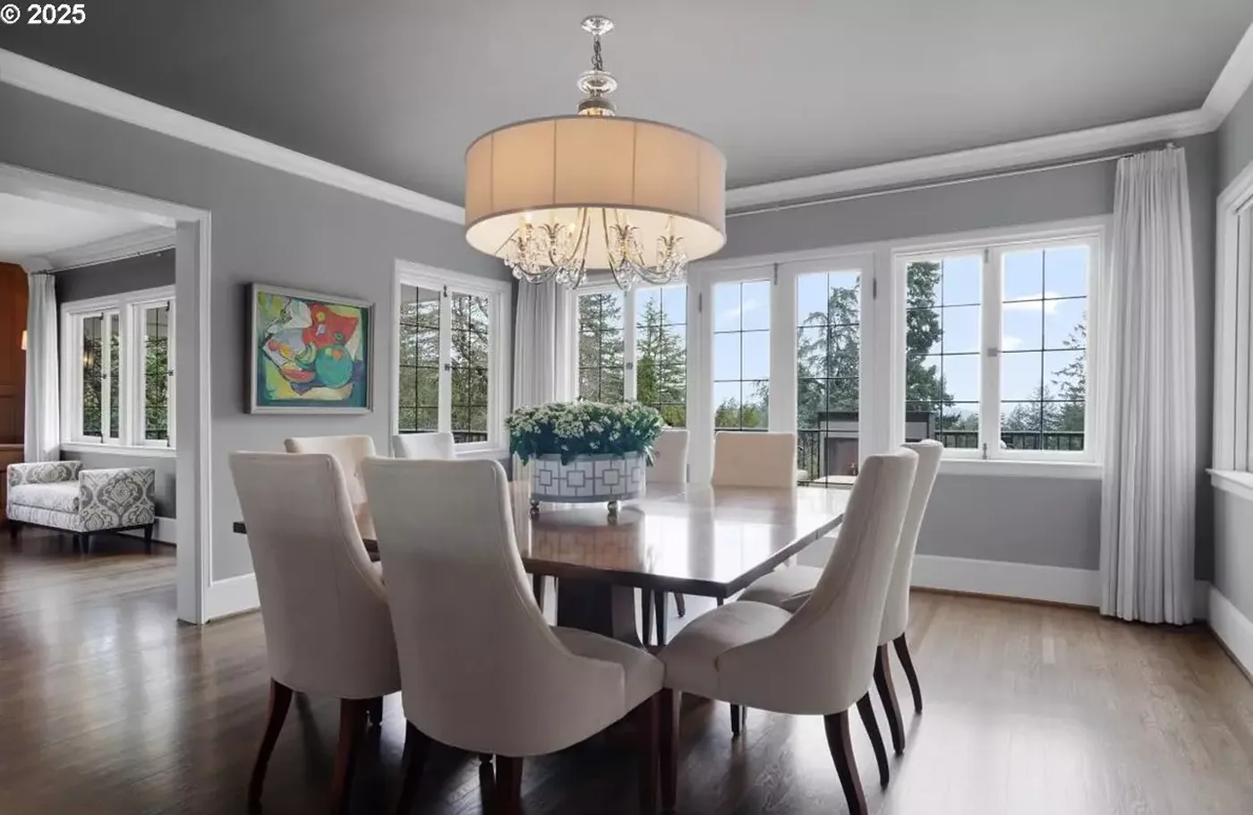 Dining room with grey walls and white trim