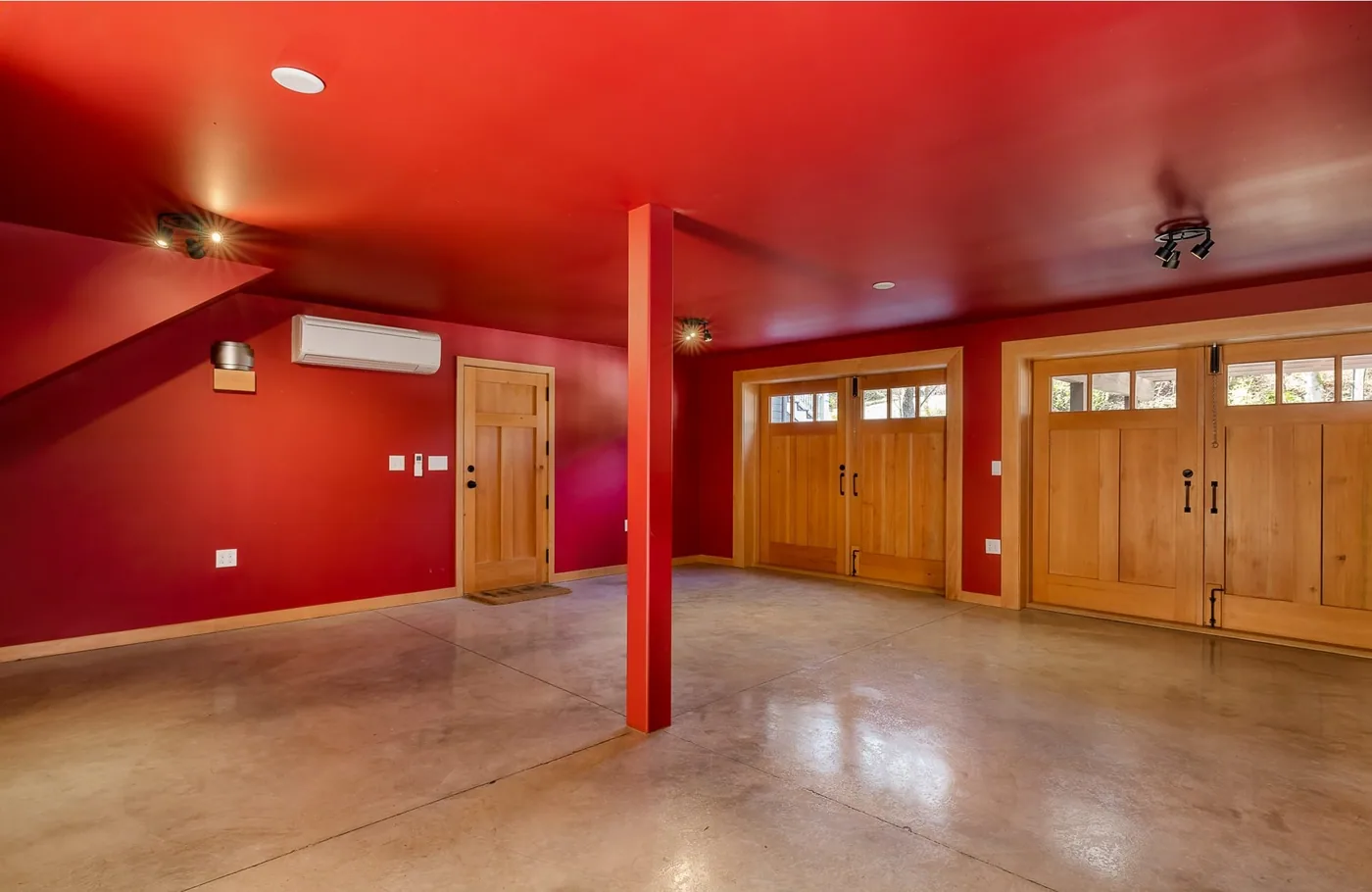 Bonus room with a bold red wall color