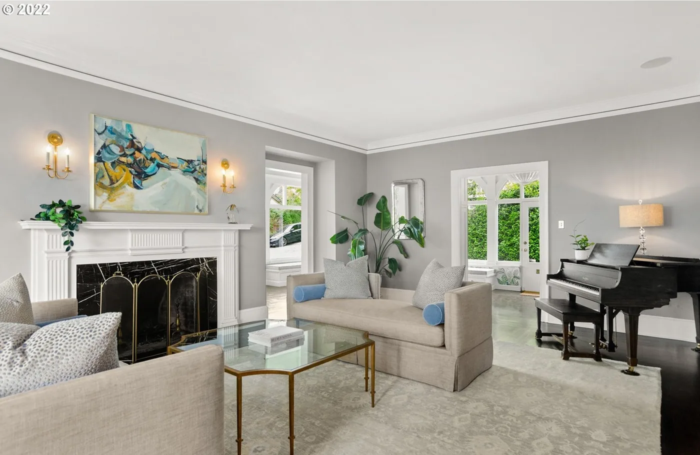 Living room with painted walls and a white fireplace