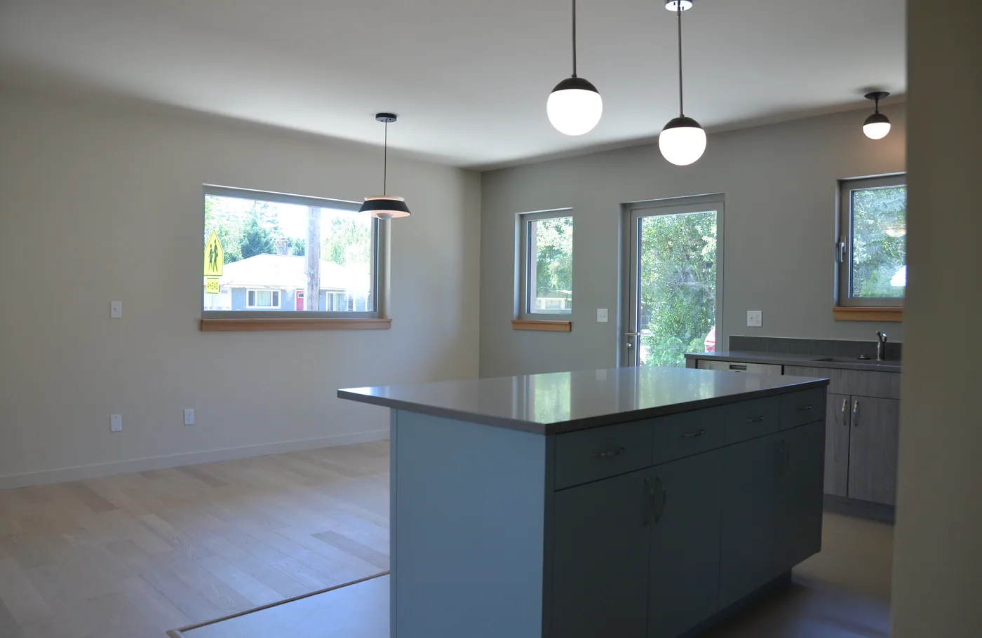 Open kitchen and dining room in soft grey