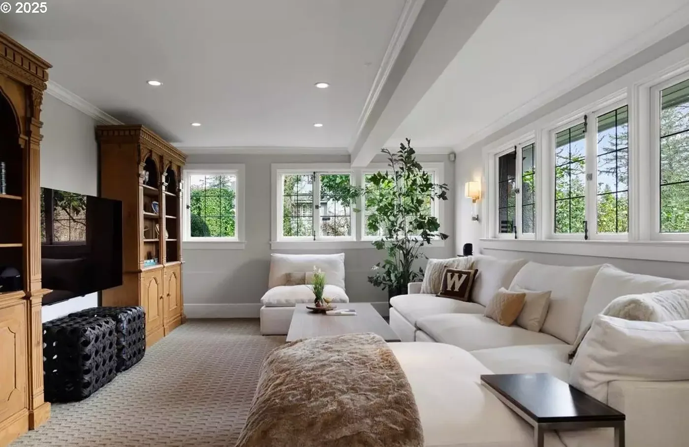 Living room with grey walls and white trim