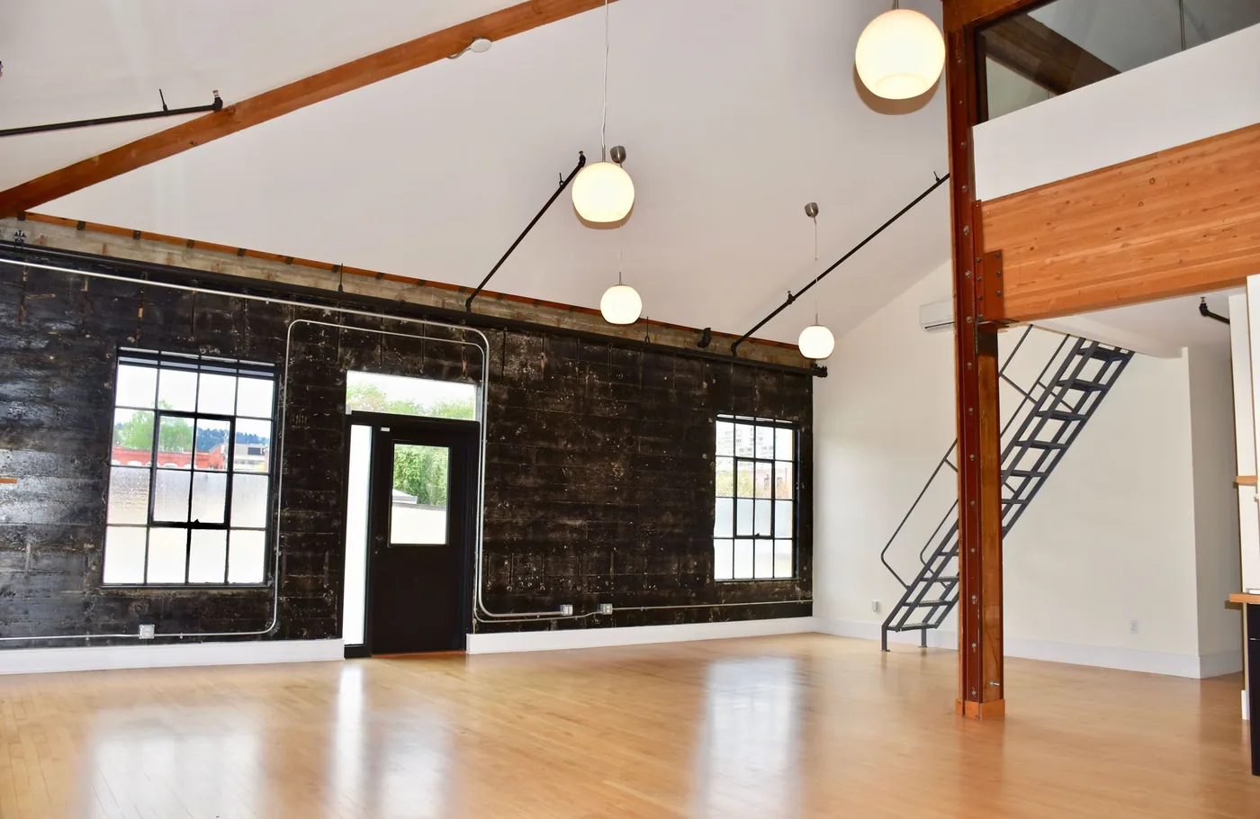 Open commercial space with painted walls and ceiling