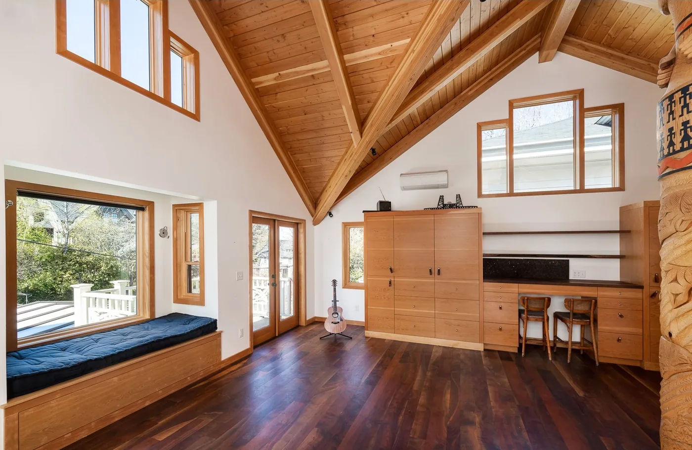 Stained wood vaulted ceiling and built-in cabinetry