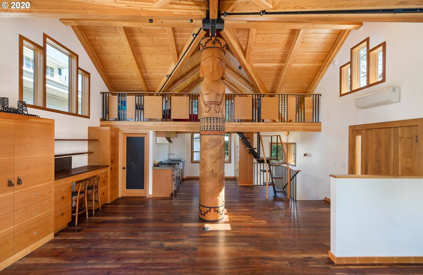 Stained timber beams, post and loft railing
