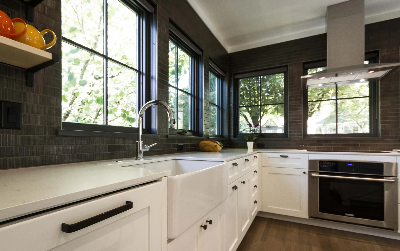 Open living and kitchen space with painted walls, trim and ceiling