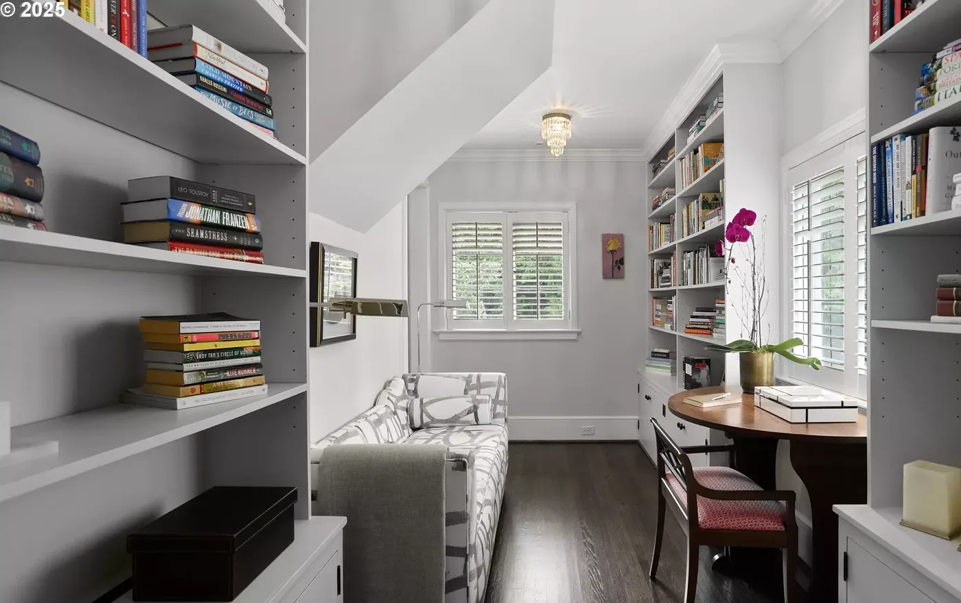 Library with painted built-in shelves